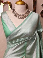 Banarasi with small floral and leaf patterns all over the body portions and geometrical pattern boarder - Image 2