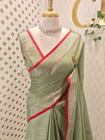Linen saree with intricate floral motifs in shades of red, yellow, and beige, accompanied by green leaves and decorative horizontal running stitches