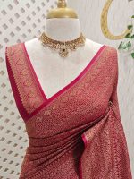 Soft katan with body features floral pattern enclosed within geometric diamond shapes. and a decorative zari border with repetitive linear and floral elements - Image 2