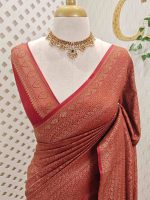 Soft katan with body features floral pattern enclosed within geometric diamond shapes. and a decorative zari border with repetitive linear and floral elements - Image 5