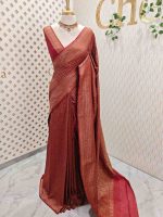 Soft katan with body features floral pattern enclosed within geometric diamond shapes. and a decorative zari border with repetitive linear and floral elements - Image 6