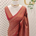 Soft katan with flower motifs and its leaf like branches across the main body and suttle boarder
