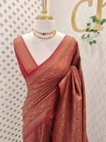 Soft katan with flower motifs and its leaf like branches across the main body and suttle boarder