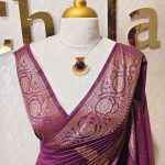 Semi tussar banarasi with detailed floral motifs woven in gold zari