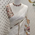 Semi tussar with warm colour floral applique work