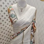 Semi tussar with multi coloured lotus on the pallu side