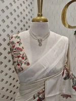 Semi tussar silk with large flowers and leafs motifs on the pallu and has plain body - Image 2