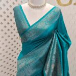 Tussar banarasi with tree like buttas and floral pattern on border