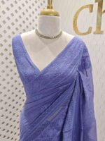 Chandheri with flower, leafy chicken kaari motif and crochet like pattern on border and pallu
