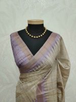 Jute silk saree with lines on the body portion and with contrast side boarder