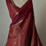 Kanjeevaram with small check, peacock buttas and thin contrast wide border