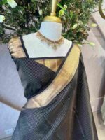 Kanjeevaram saree with a check pattern across the main body and complemented by a rich border and pallu - Image 11
