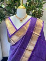 Kanjeevaram saree with a check pattern across the main body and complemented by a rich border and pallu - Image 7