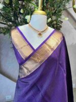 Kanjeevaram saree with a check pattern across the main body and complemented by a rich border and pallu - Image 8