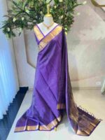 Kanjeevaram saree with a check pattern across the main body and complemented by a rich border and pallu - Image 9