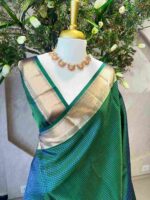 Kanjeevaram saree with a check pattern across the main body and complemented by a rich border and pallu - Image 2