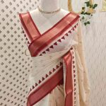Kerala saree with circle pattern on the body and contrast geometric boarder