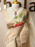 Kerala saree with prints of large blossom like prints on the pallu and body