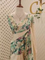 Kerala saree with simple body and multi coloured thick floral prints