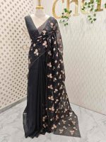 Net kota saree with thread work embroidery in a repeating pattern of leaves and small berry-like clusters on a vine - Image 6