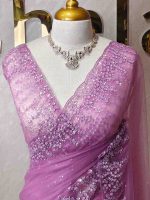 Net saree with a combination of floral sequin motifs and delicate beadwork, often with a decorative scalloped border - Image 2