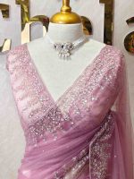 Net saree with a combination of floral sequin motifs and delicate beadwork, often with a decorative scalloped border - Image 5