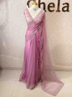 Net saree with a combination of floral sequin motifs and delicate beadwork, often with a decorative scalloped border - Image 6