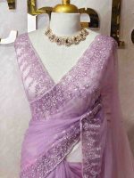 Net saree with a combination of floral sequin motifs and delicate beadwork, often with a decorative scalloped border - Image 7