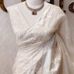 Organsa saree with elegant thread work on boarder along with a scalloped edje