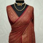 Soft katan with leaf like round shaped patterns all over the main body and boarders with flower motifs