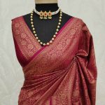 Soft katan with  specially shaped leaf and branches all over the saree and with simple floral boarder