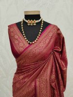 Soft katan with  specially shaped leaf and branches all over the saree and with simple floral boarder