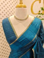 Soft silk saree with dotted lines on the body and with simple plain boarder - Image 11