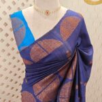 Tussar banarasi with dotted round buttas,big round brocade design and contrast blouse