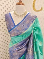 Tussar banarasi with flower buttas and contrast blouse and border