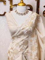 Tissue saree with elegant small flower motifs on the boarder of the saree