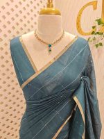 Tisse saree with stripes on the body along with sequins work - Image 14