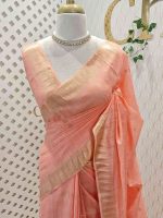 Tissue saree with small square motifs on the body and with simple side boarder - Image 13