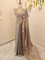 Tissue saree with golden woven motifs scattered on the body and with simple side boarder - Image 3
