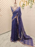 Tissue saree with golden woven motifs scattered on the body and with simple side boarder - Image 9