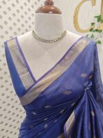Tissue saree with golden woven motifs scattered on the body and with simple side boarder - Image 8