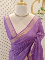 Tissue saree with golden woven motifs scattered on the body and with simple side boarder - Image 11