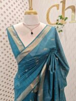 Tissue saree with golden woven motifs scattered on the body and with simple side boarder - Image 16