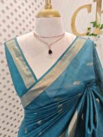 Tissue saree with golden woven motifs scattered on the body and with simple side boarder - Image 17