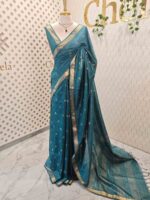 Tissue saree with golden woven motifs scattered on the body and with simple side boarder - Image 18