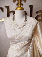 Tussar silk  with  subtle thread work on the boarder along with cutwork scalloped side boarder