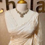 Tussar silk with self colour thread work featuring floral motifs along with elegant side boarder