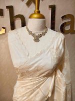 Tussar silk with self colour thread work featuring floral motifs along with elegant side boarder