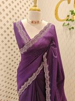 Crushed silk with scalloped cut-work border embellished with intricate silver stone work or sequins.