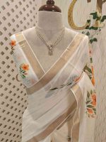 Kerala saree with large lily-like flowers with delicate green stems and leaves. - Image 2
